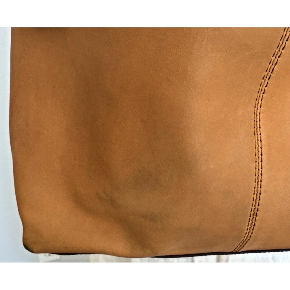 The Sak Women's Huntley‎ Leather Hobo Bag Metro Sling Pebbled Tan with Tassel